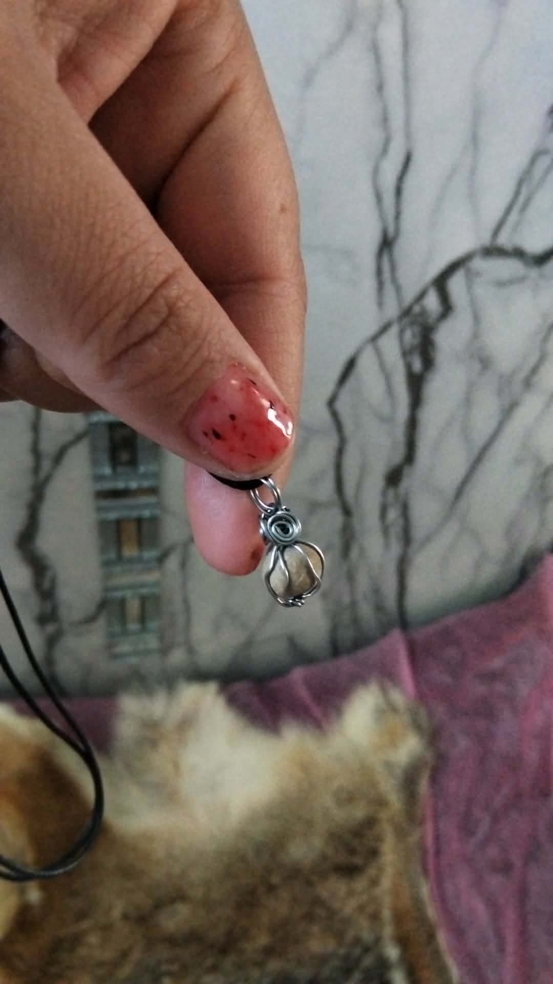 Detalle de dije